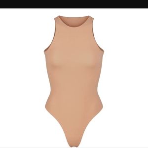 NWOT SKIMS FITS EVERYBODY HIGH NECK BODYSUIT WOMEN'S LARGE OCHRE